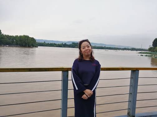 说明:E:\商学院\西译官网 商学院网站\3师资队伍\3个人上交:教师简介\国际经济系师资简介\李娜.jpg